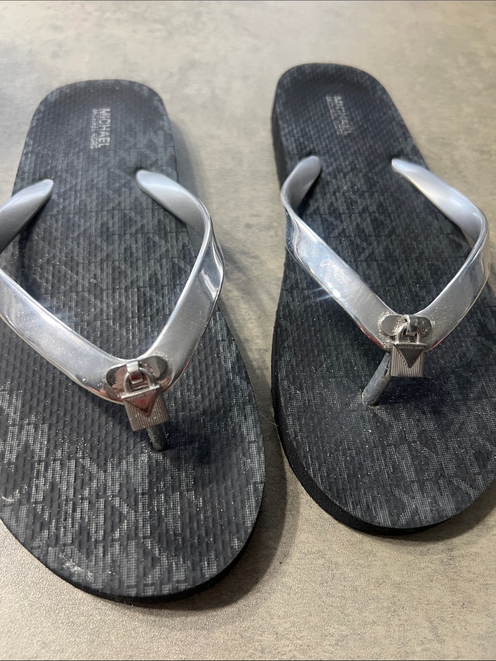 Michael Kors Black Flip Flops with Silver Straps